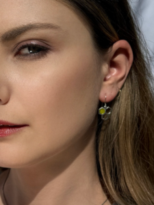 honeycomb enamel earrings on model
