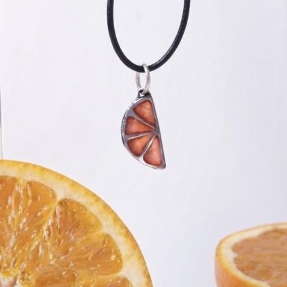 Orange enamel pendant